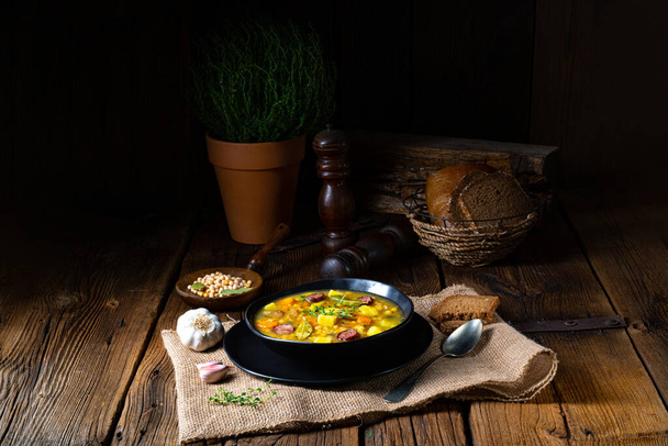 Rustic pea soup with bacon and sausages - Zdjęcie, obraz