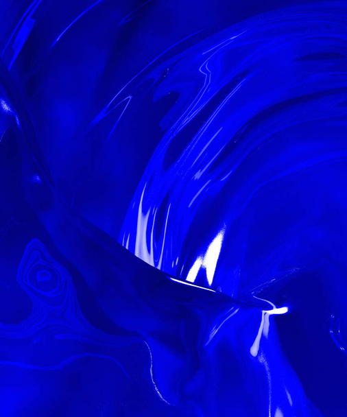 Schöne blaue Flüssigkeit abstrakte Wirbel mit Lichthöhepunkten. - Foto, Bild
