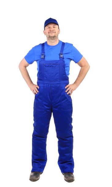 Worker in blue overalls. - Fotografie, Obrázek