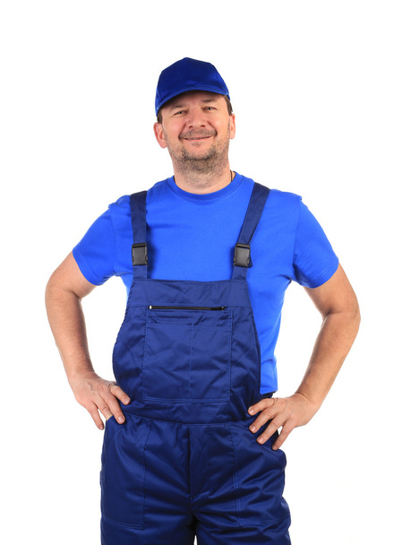 Worker in blue overalls. - Valokuva, kuva