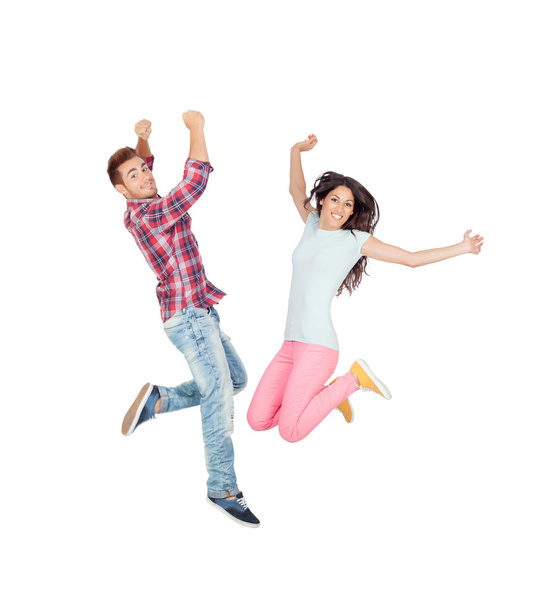 Пара молодых влюблённых прыгают
 - Фото, изображение