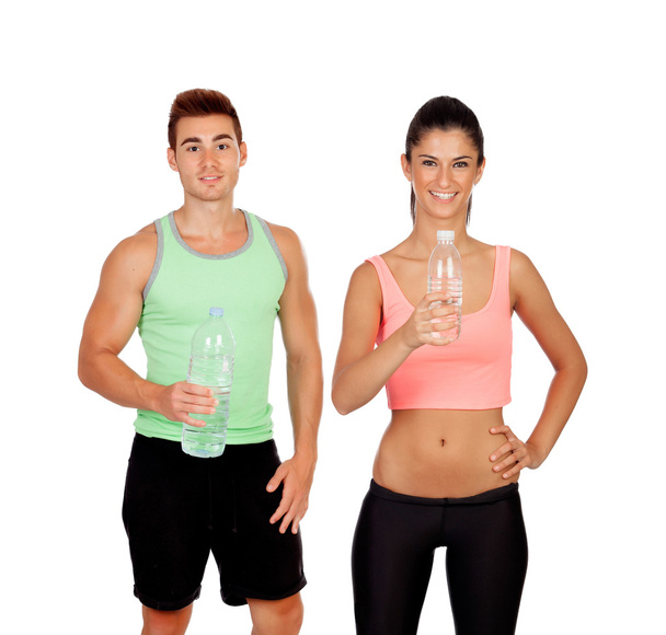 Young couple at the gym drinking water - Fotografie, Obrázek