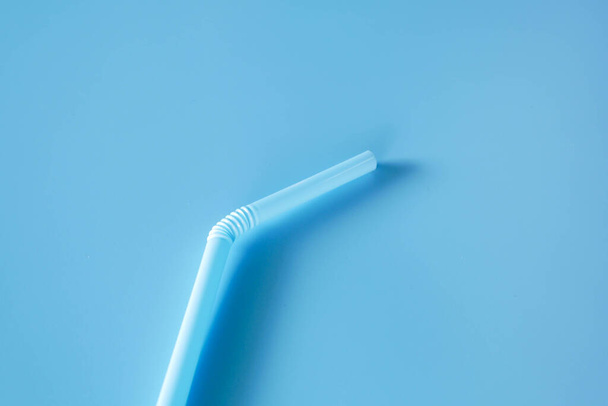drinking straw on blue background - Photo, Image