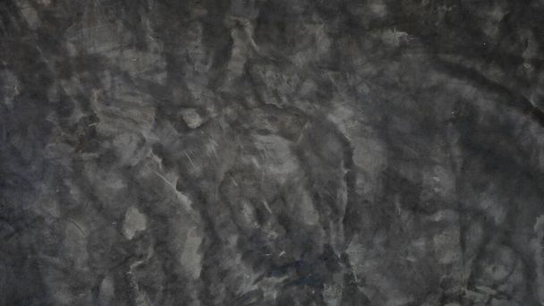 zwarte cementwand achtergrond. abstracte concrete textuur voor achtergrond - Foto, afbeelding