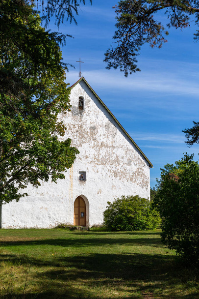 White old lutheranic church in springtime - Φωτογραφία, εικόνα