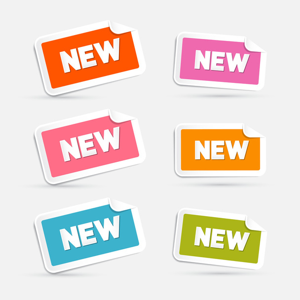 Adesivos vetoriais coloridos com novo título isolado em fundo cinza
 - Vetor, Imagem