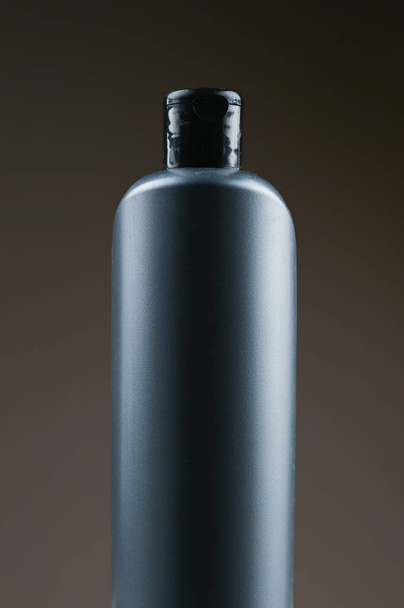 mockup plastic bottle on dark background. High quality photo - Photo, Image