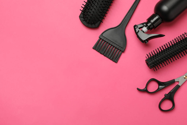 Composition with hairdresser accessories on pink background, space for text - Fotoğraf, Görsel