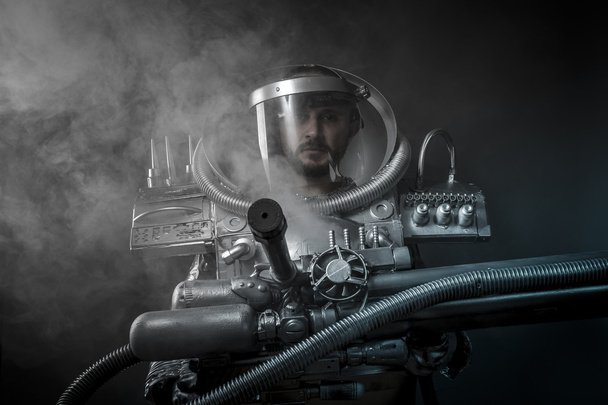 Future Astronaut with huge weapon. - Foto, Bild