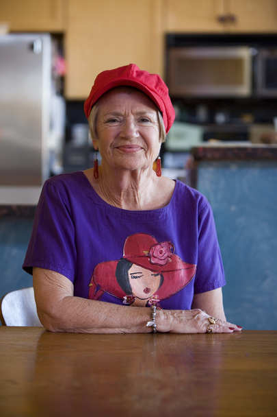 Senior Woman Wearing Red Hat - 写真・画像