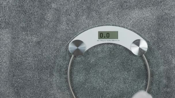 Bathroom scales with LCD screen saying Help - Footage, Video