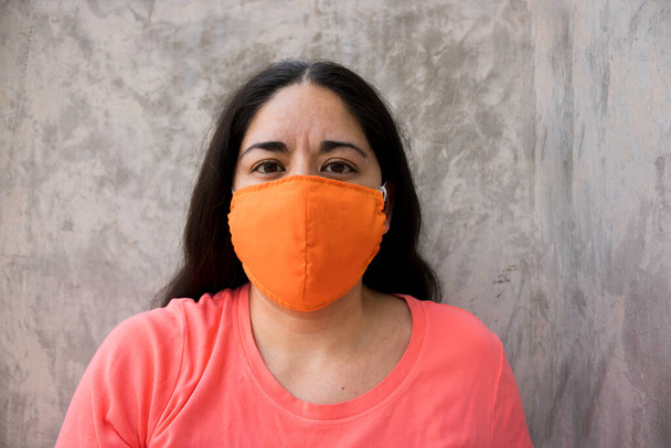 The face mask or face mask is an essential tool to avoid microbiological contamination emitted from the mouth and nose. - Photo, Image
