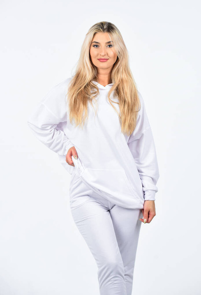 Sport style. Feel so sporty. Fitness woman wear sportswear. Impeccable style. Street fashion. Girl in sweatpants and hoodie. Cute girl in training clothes. Fashionable sportswear. Trendy sportswear - Valokuva, kuva