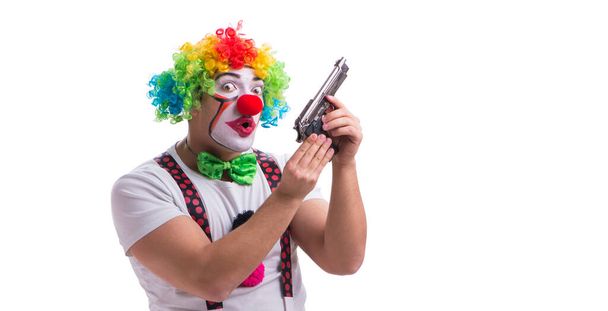 Смешной клоун с пистолетом на белом фоне - Фото, изображение