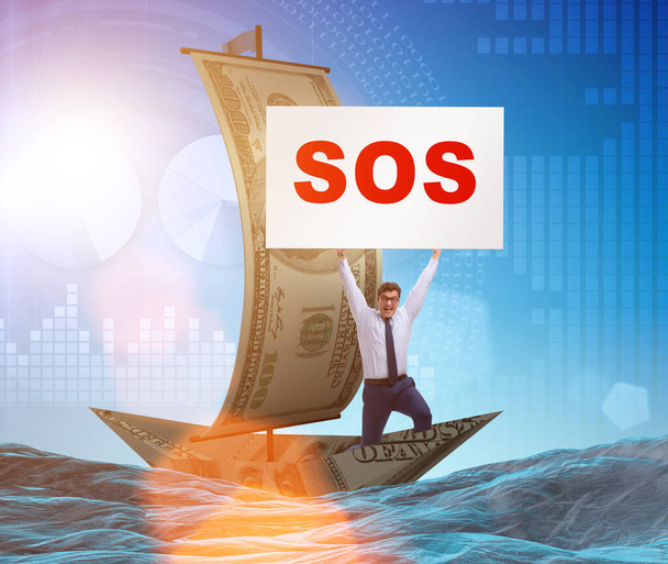 Бизнесмен просит помощи с SOS-сообщением на борту - Фото, изображение