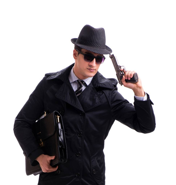 człowiek szpieg z pistolet odizolowany na białym tle - Zdjęcie, obraz