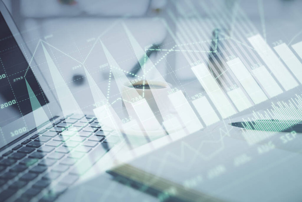 Double exposure of financial chart drawing and desktop with coffee and items on table background. Concept of forex market trading - Valokuva, kuva