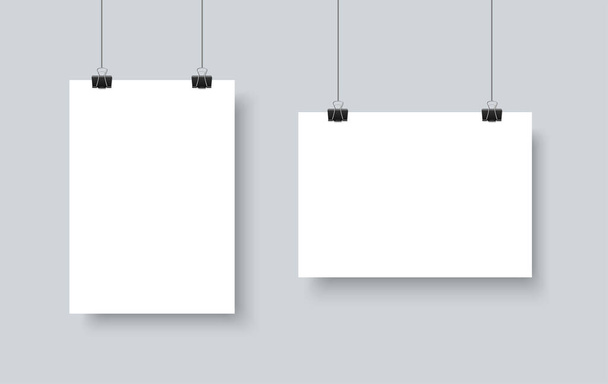 White blank realistic sheets of paper hangs on the clamps - Vector, Image