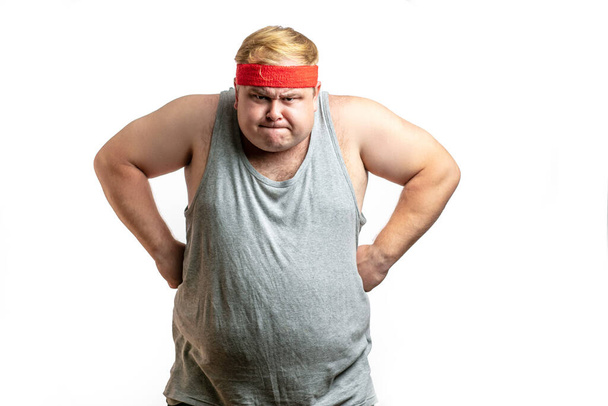 Fat man, feeling furious, in fight stance ready to hit, white isolated studio - Photo, Image