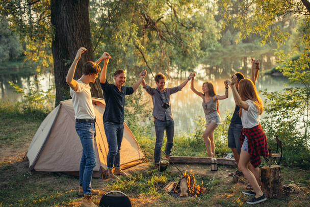 hipsters are spending funny time at campsite - Photo, image