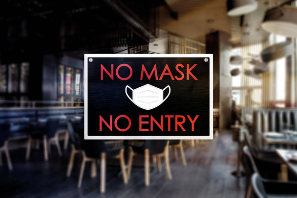 Geen masker geen toegang teken van een restaurant of cafe. Strikte regels en voorschriften tijdens het coronavirus. - Foto, afbeelding