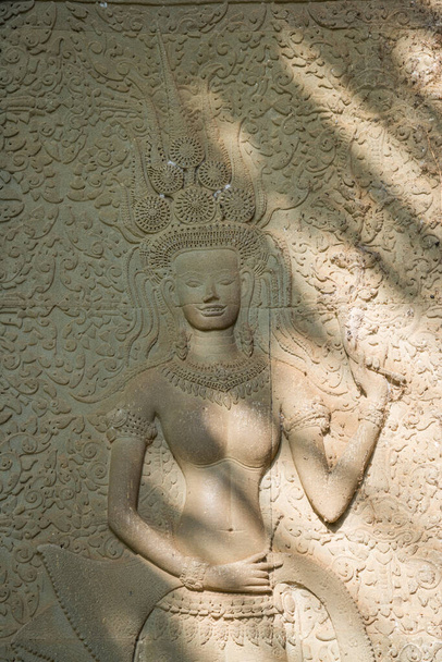 Die Landschaft des Basreliefs des Smileys Apsara in einem Angkor Wat in Siem Reap, Kambodscha. - Foto, Bild