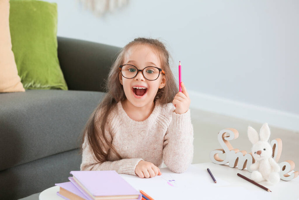 Cute little girl drawing at home - Photo, Image