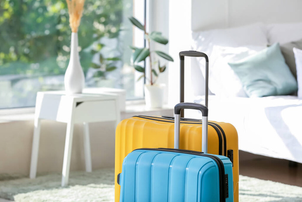 Packed suitcases at home. Travel concept - Фото, изображение