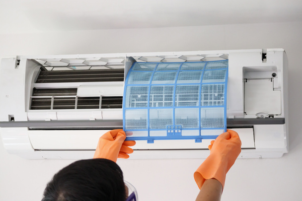 Asian man hand hold air conditioner filter cleaning concept - Photo, Image