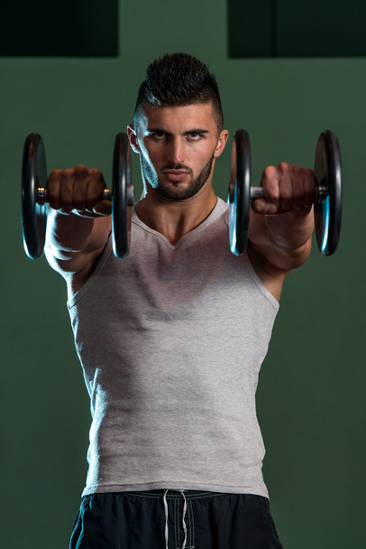 Young Men Doing Exercise For Shoulder - Foto, immagini