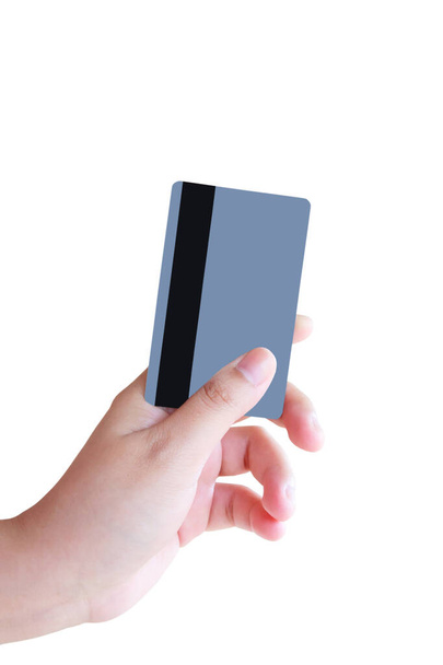 mano femenina con tarjeta de crédito aislada sobre fondo blanco - Foto, imagen