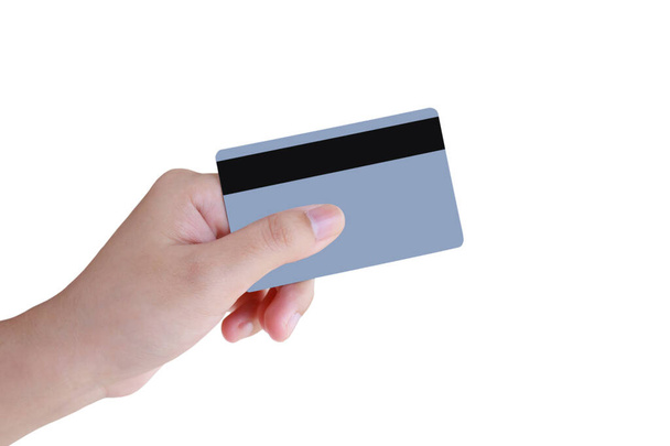 白い背景に孤立したクレジットカードを持っている女性の手 - 写真・画像