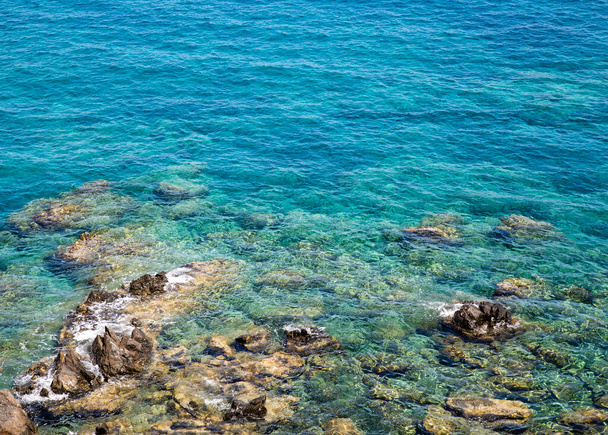 Turquoise sea and rocks. Vacation mood.  - Fotó, kép