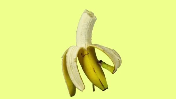 Animowane nagranie z timelapse jedzonego banana  - Materiał filmowy, wideo