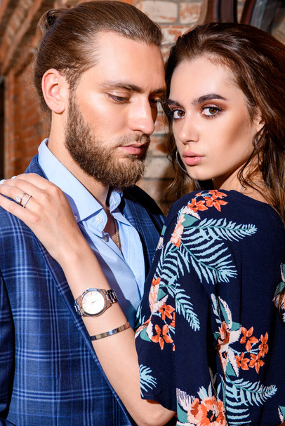 Close-up portrait of a beautiful young people in love in the city. Summer fashion.  - Foto, Imagen