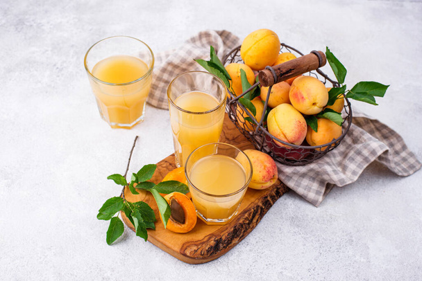 Apricot juice in glass. Healthy drink - Zdjęcie, obraz