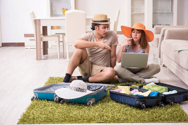 Young couple preparing for trip - Photo, Image