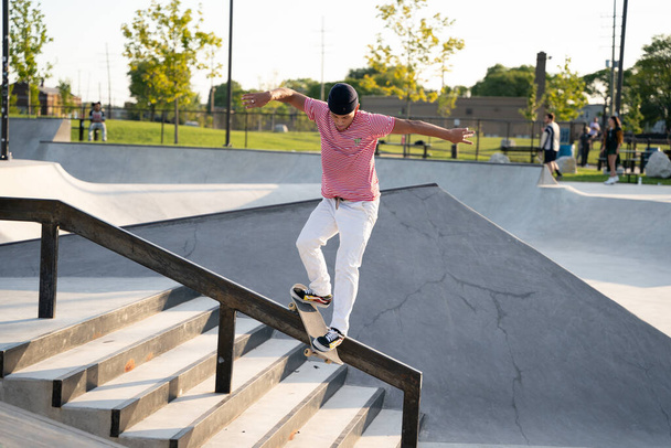 Detroit, Michigan, USA, August 6, 2020, skaters practice tricks in  skate park - Fotó, kép