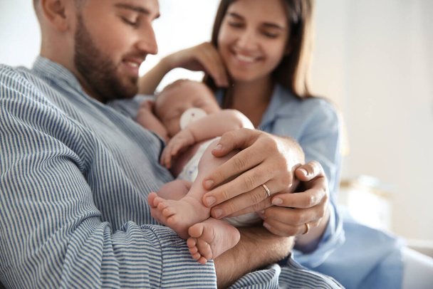 Happy couple with their newborn baby, closeup - Valokuva, kuva