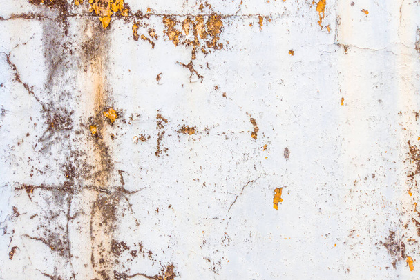 Старая текстура бирюзово-голубая трещина стены, старая текстура краски сколы и трещины падения разрушения - Фото, изображение