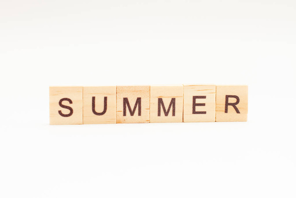 SUMMER words on wooden blocks. Concept Seasons of year. - Foto, imagen