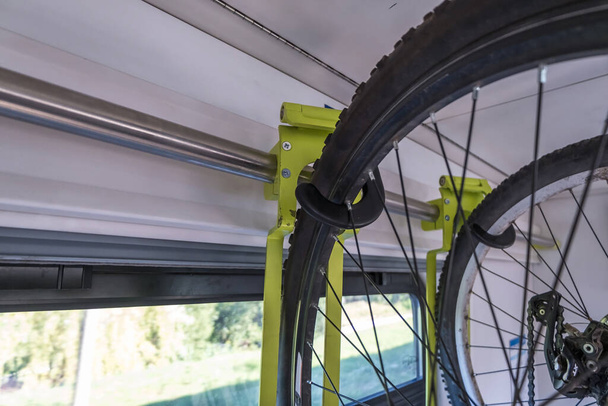 bike carrier on a train. Transport device for bicycles in the wagon. - Foto, Imagem