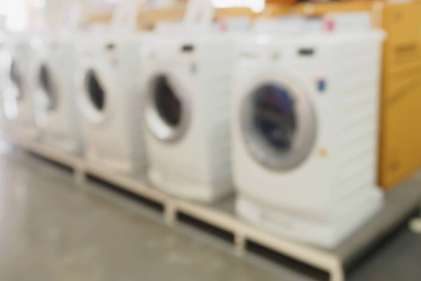 Arka plan için elektronik mağazadaki bulanık çamaşır makineleri - Fotoğraf, Görsel