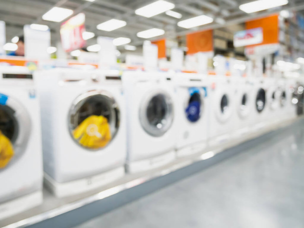 Çamaşır makineleri arkaplanı bulanık eletronik mağaza - Fotoğraf, Görsel