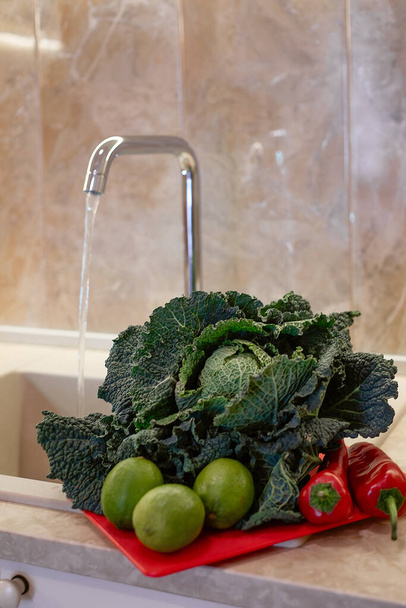 Fresh colorful organic vegetables on kitchen - Φωτογραφία, εικόνα