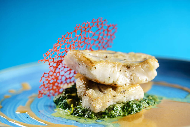 zander with spinach and sauce - Photo, image