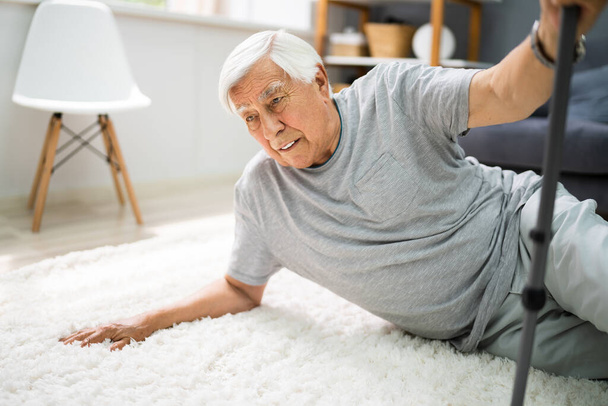 Elderly Senior Man Slip And Fall. Fallen Old Person - Valokuva, kuva