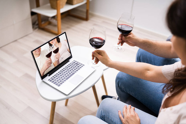Virtual Wine Tasting Using Laptop. Online Party And Drinks - Φωτογραφία, εικόνα