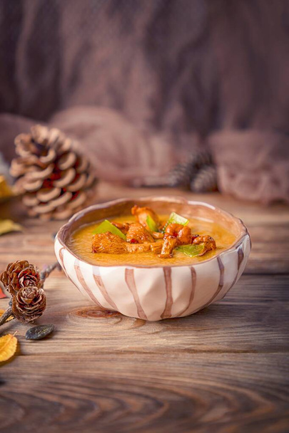 Homemade soup with pumpkin and chanterelle mushrooms. Autumn soup - Photo, Image