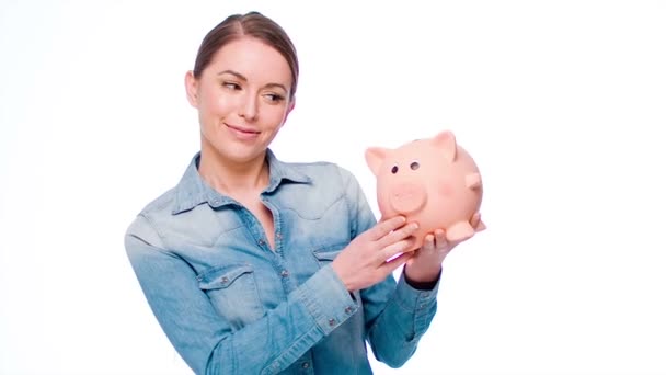 Girl Holding Piggy Bank - Footage, Video